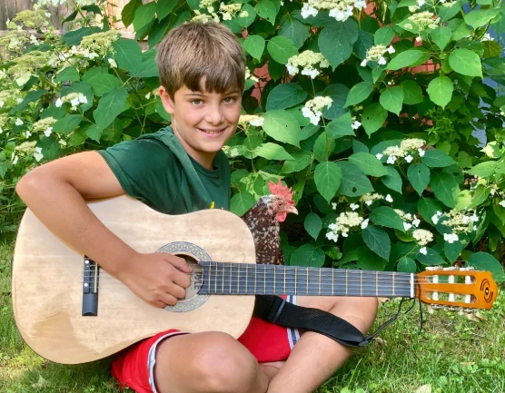 Luke playing guitar